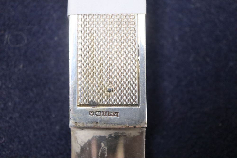 A modern silver mounted cigar cutter, 15.2cm.